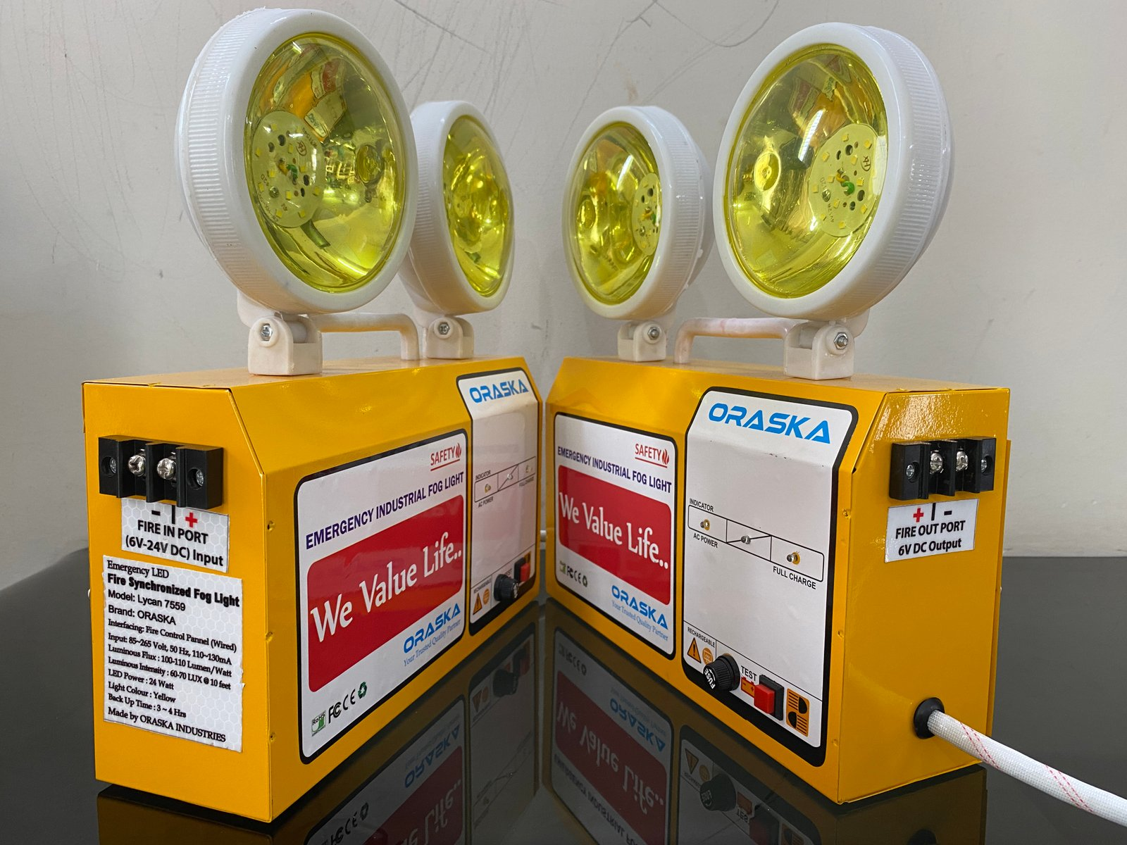 ORASKA Lycan7559 fire panel connected emergency fog light with IN & OUT ports, 24W yellow LED, and 6V 4.5Ah battery